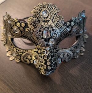 Elegant Black and Gold Masquerade Mask
